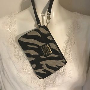 Ann klien zebra print change wristlet